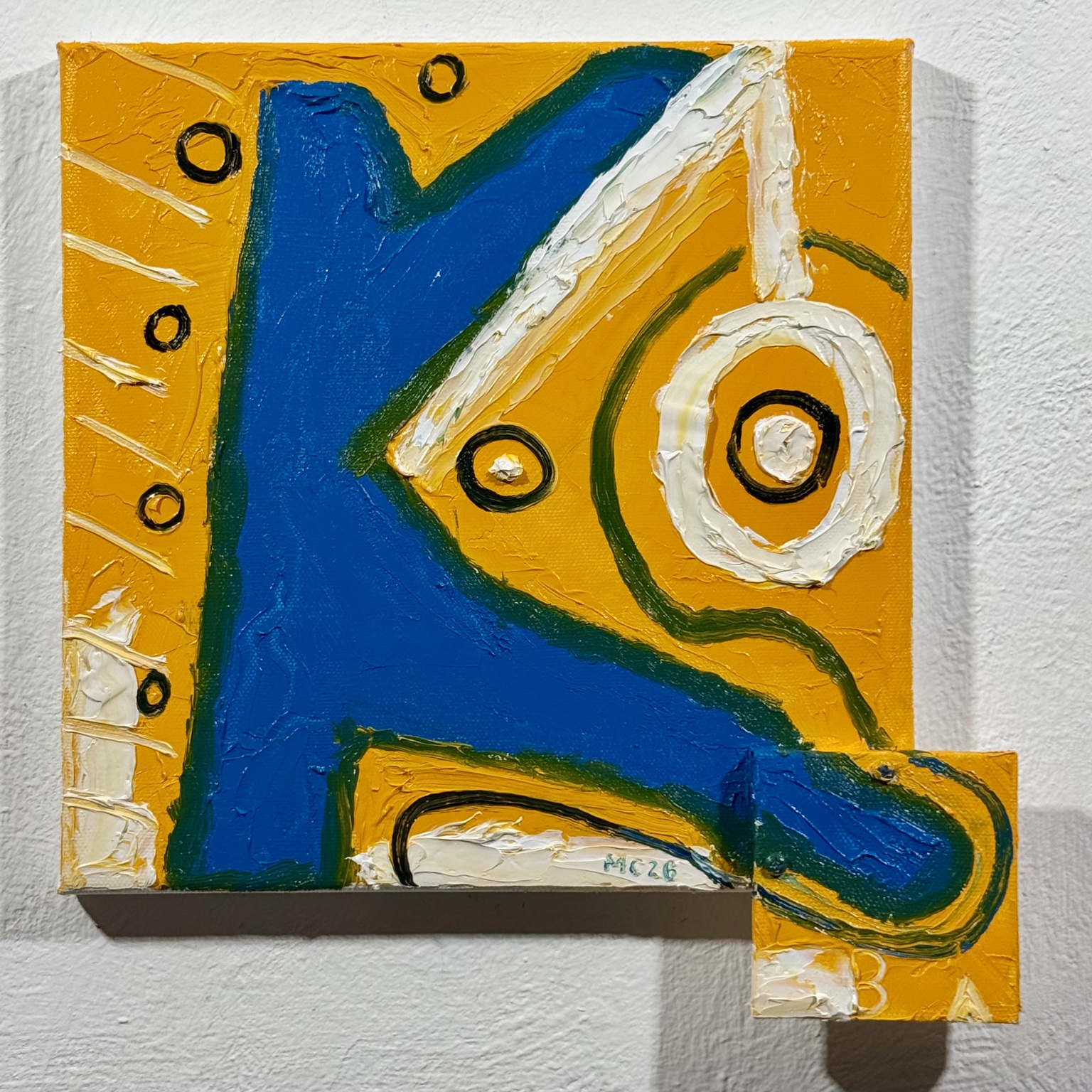 Koba, oil painting by Mario Caoile with a deep blue form, golden yellow ground, white and green strokes, and a small attached canvas extending from the lower right