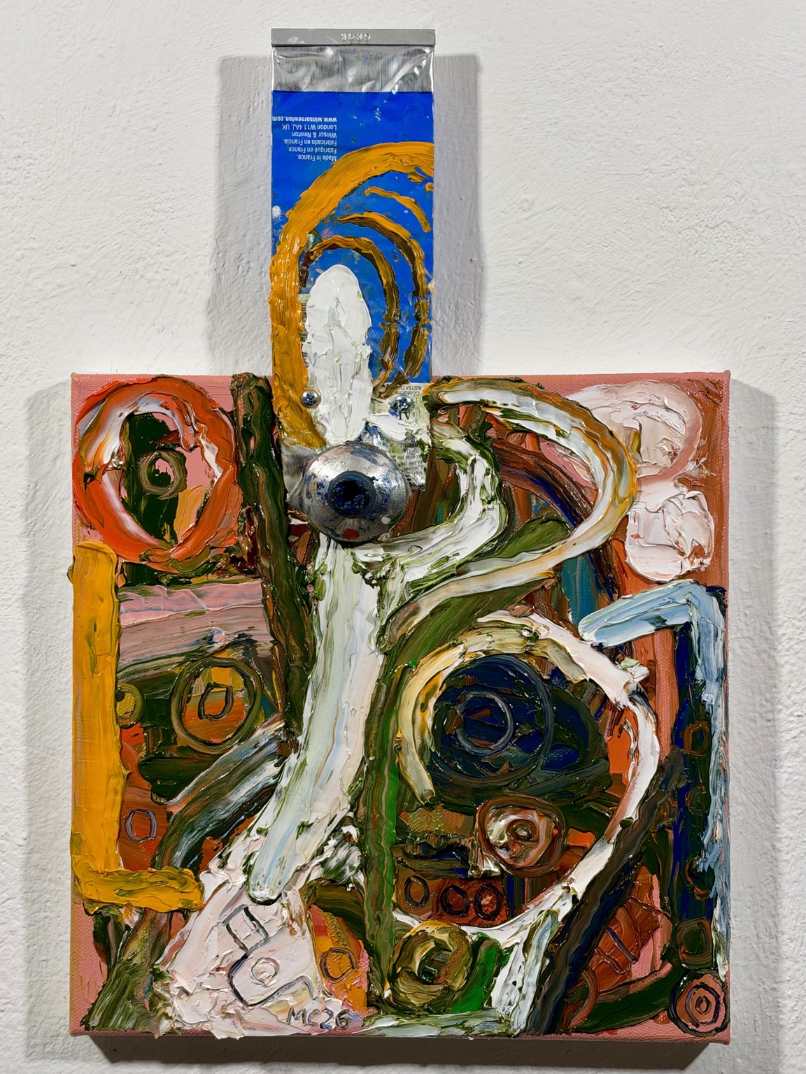 Lummox, oil painting by Mario Caoile with thick sweeping white, yellow, green and orange strokes and an attached blue paint tube extending above the canvas